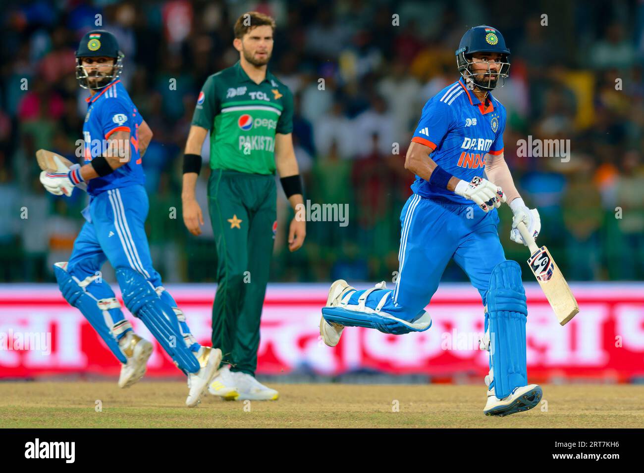 Colombo, Sri Lanka. 11th September 2023. Shaheen Shah Afridi of Pakistan looks on as Virat Kohli (L) and KL Rahul of India (R) runs between the wickets  during the Asia Cup 2023 super four one-day international (ODI) cricket match between India and Pakistan at the Premadasa Stadium in Colombo on 11th September, 2023. Viraj Kothalwala/Alamy Live News Stock Photo