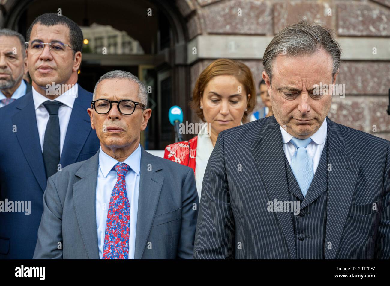 Antwerp, Belgium. 11th Sep, 2023. (front L-R) Moroccan ambassador to Belgium Mohammed Ameur and Antwerpen Mayor Bart De Wever are pictured at a memorial ceremony for the victims of the earthquake in Morocco, at the Grote Markt, in Antwerp, Monday 11 September 2023. The earthquake that hit Morocco late Friday killed at least 2,122 people and injured more than 2,400 others. BELGA PHOTO JONAS ROOSENS Credit: Belga News Agency/Alamy Live News Stock Photo
