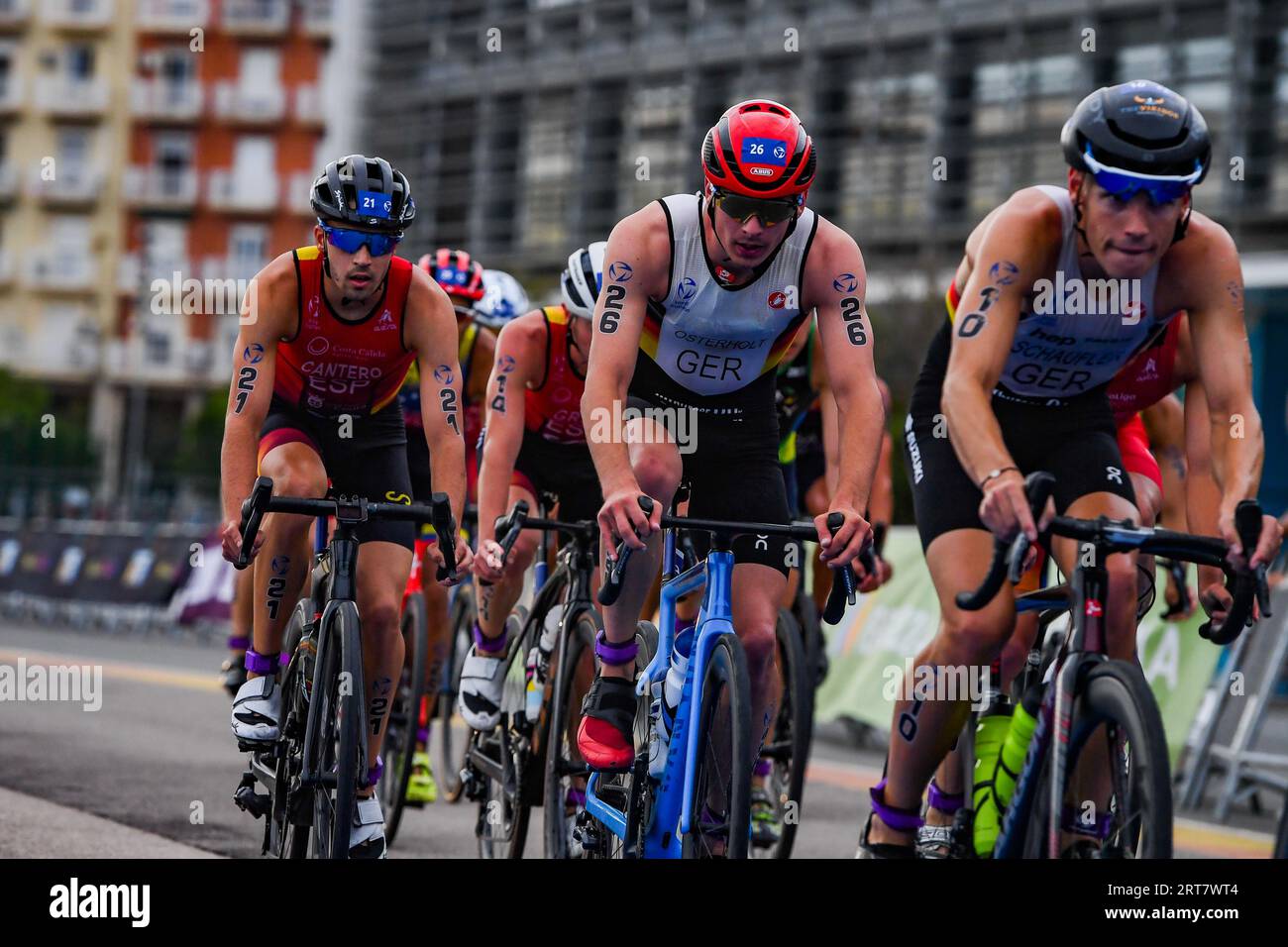 Valencia, Spain. 03rd Sep, 2023. Cedric Osterholt (C) of Germany and David Cantero Del Campo (R) of Spain in action during the bike race of 2023 Triathlon World Cup in La Marina de Valencia. Credit: SOPA Images Limited/Alamy Live News Stock Photo