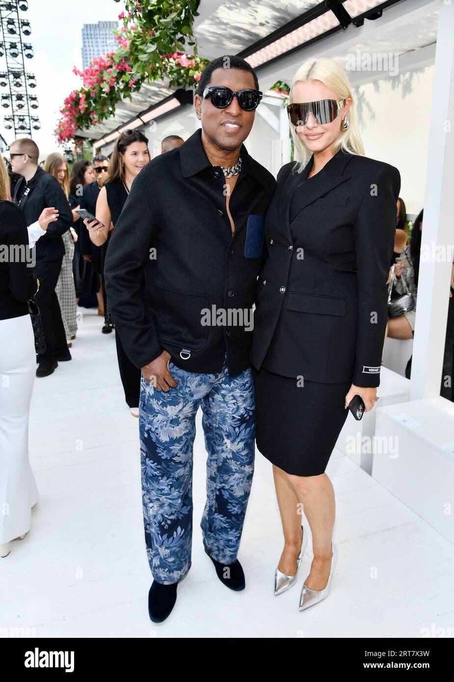 "Babyface"Edmonds, left, and girlfriend Rika Tischendorf attend