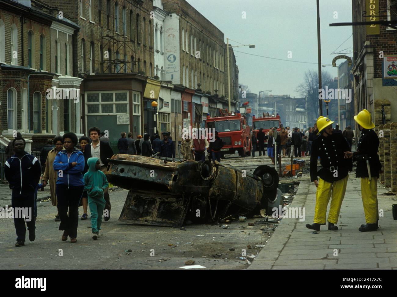 Brixton Riots 1980s UK.  The day after local local people looking at damage caused to their neighbourhood. Brixton South London Uk April 1981 England HOMER SYKES. Stock Photo