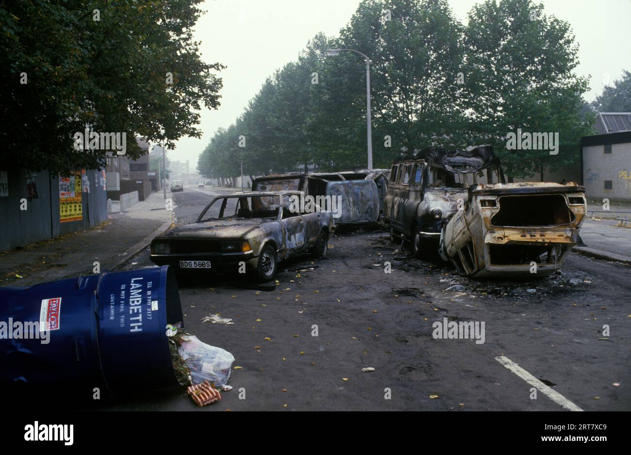 Brixton Riots 1980s UK.  The day after the riot damage burnout cars in the street. Brixton South London Uk April 1981 England HOMER SYKES. Stock Photo