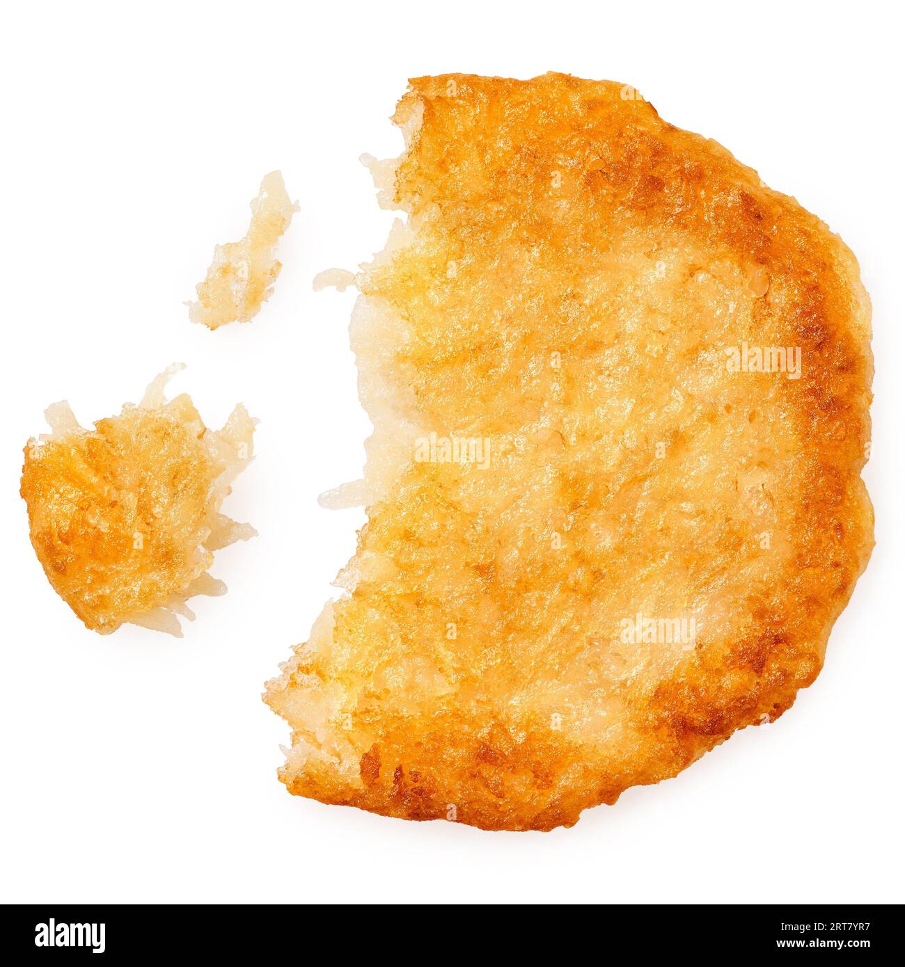 Potato pancake isolated on white. Partially eaten with crumbs. Top view. Stock Photo