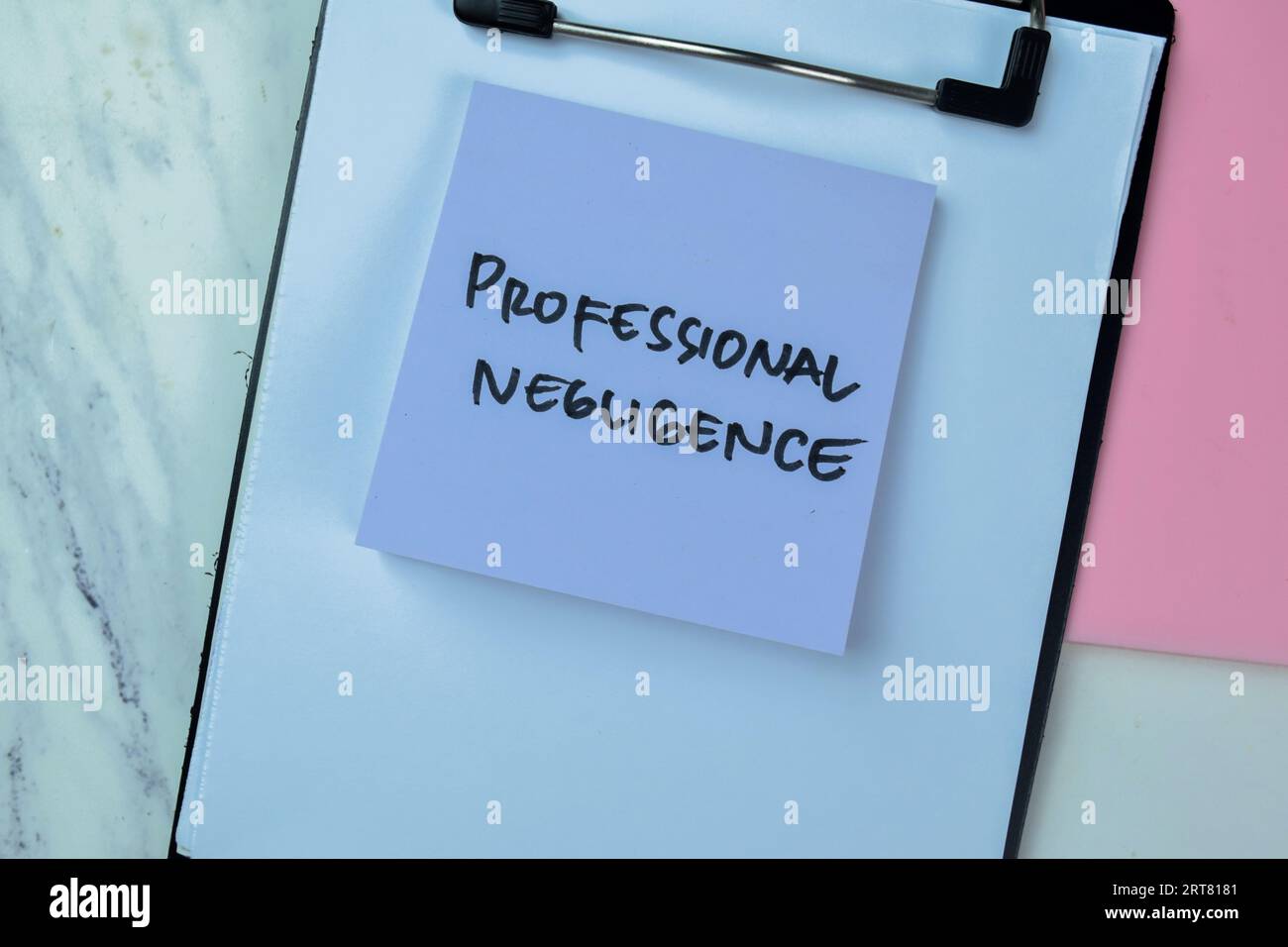 Concept of Professional Negligence write on sticky notes isolated on Wooden Table. Stock Photo