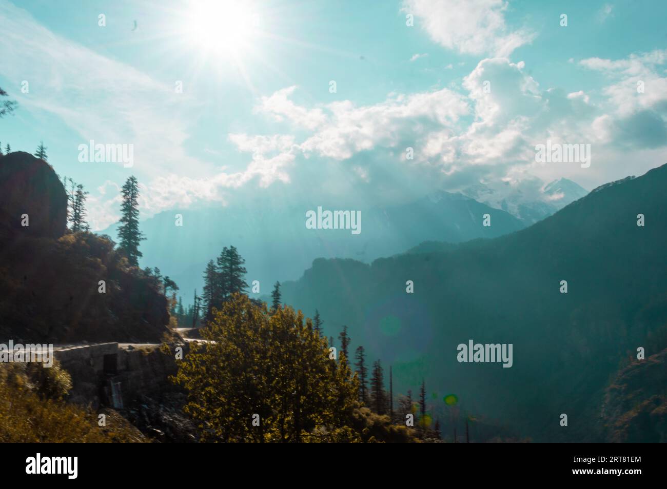 Beautiful Sunset sunlight falling over mountains Stock Photo - Alamy