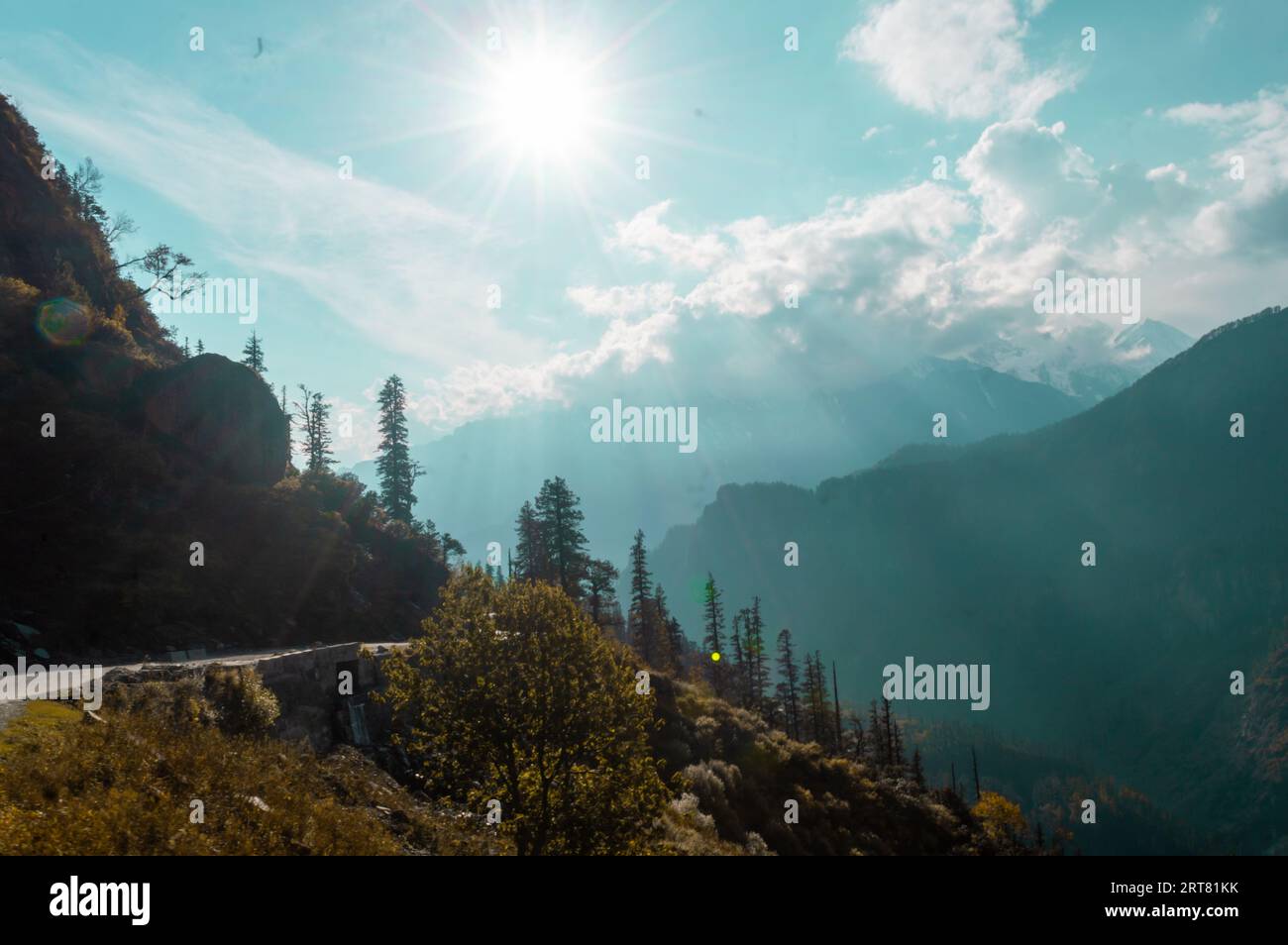 Beautiful Sunset sunlight falling over mountains Stock Photo - Alamy