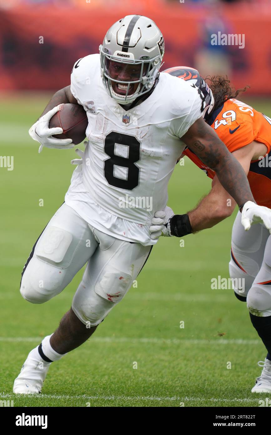 Denver Broncos linebacker Alex Singleton (49) looks into the