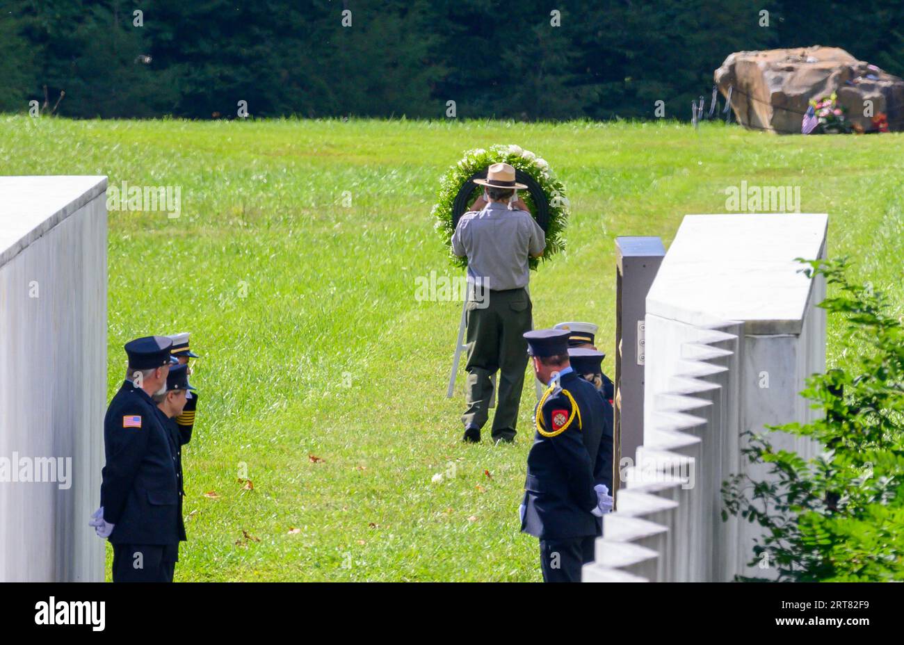 Shanksville, United States. 11th Sep, 2023. A wreath is slowly walked to the boulder that marks