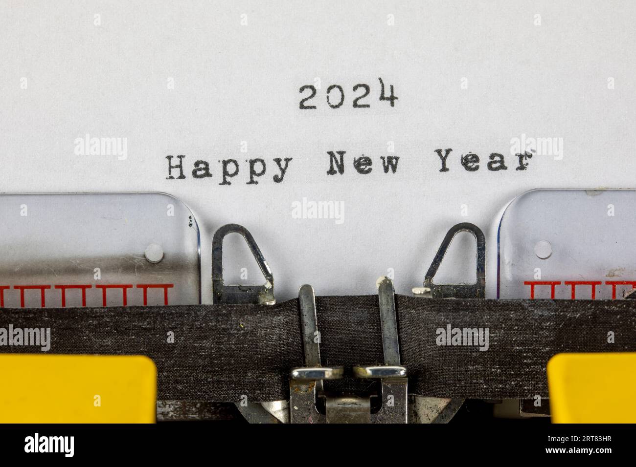 Happy New Year 2024 written on an old typewriter Stock Photo