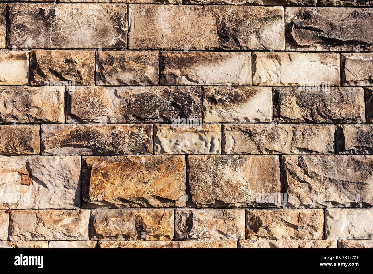 Wall made from rectangular granite blocks, background or texture design element Stock Photo