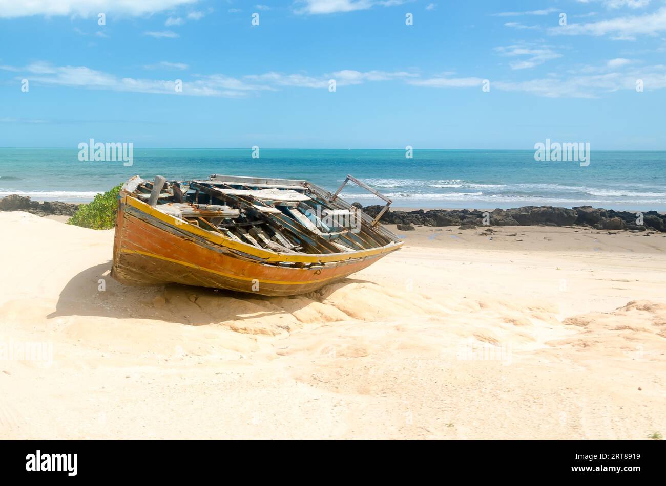 Front view of a broken canoe over the white sandy beach Stock Photo Alamy