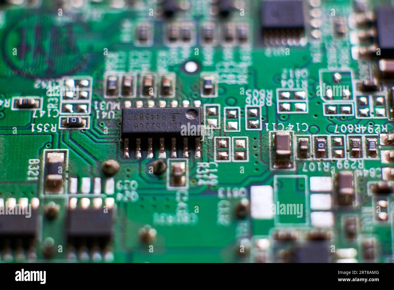 Printed circuit Board with chips and radio components electronics Stock Photo