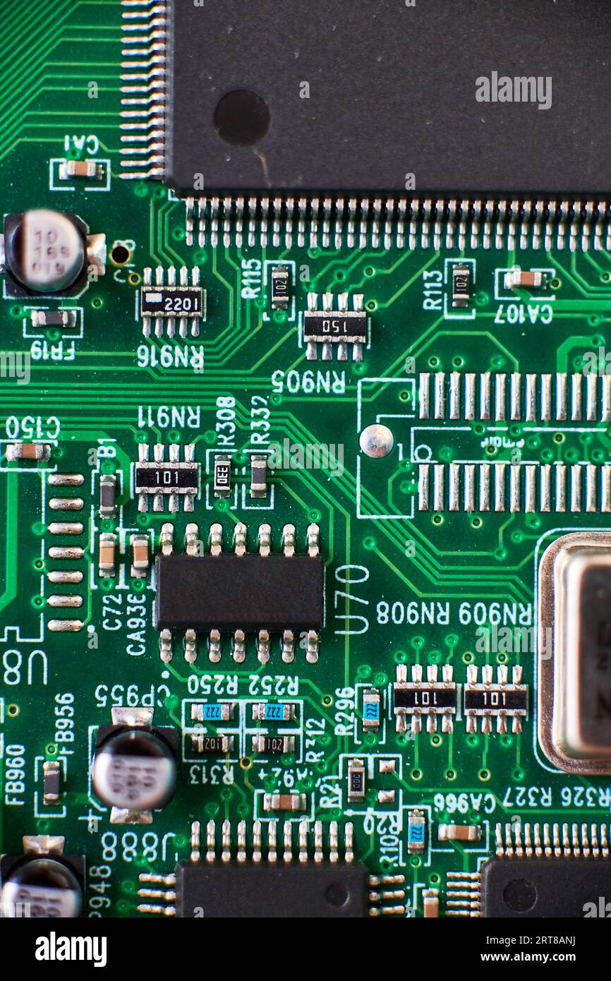 Printed circuit Board with chips and radio components electronics Stock Photo