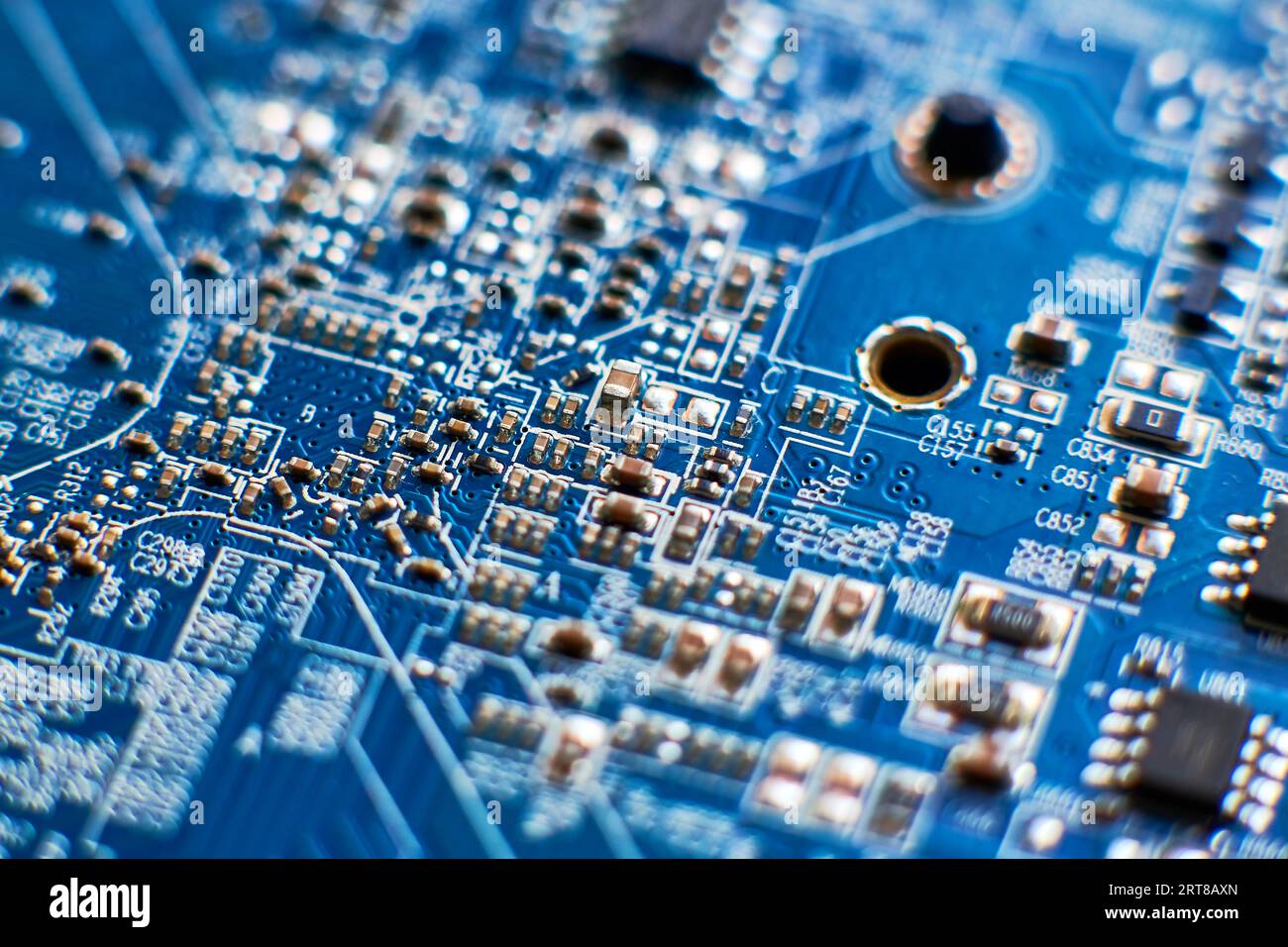 Printed circuit Board with chips and radio components electronics Stock Photo