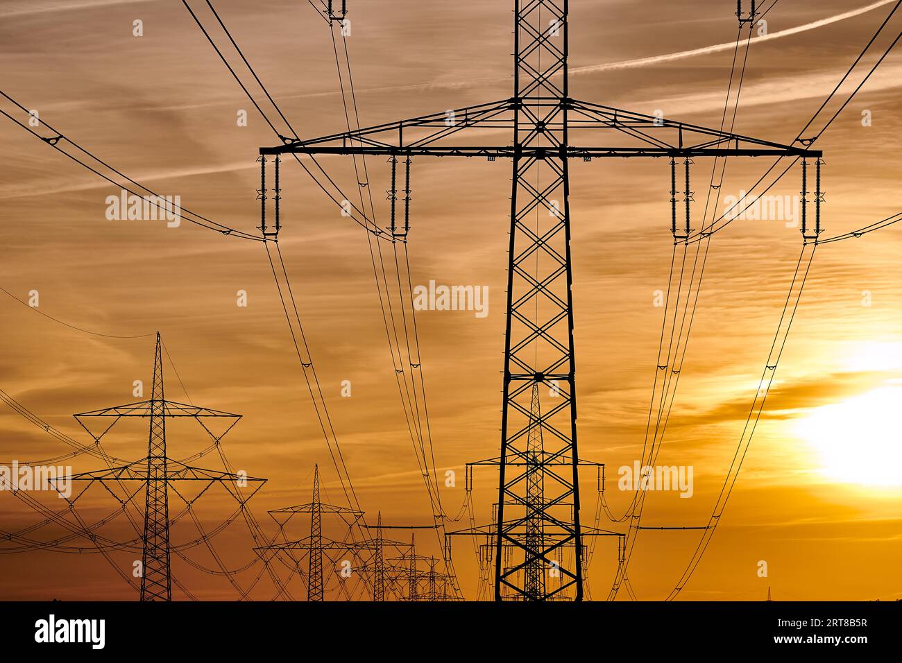 Electricity transportation with hgh voltage wire on pylon Stock Photo