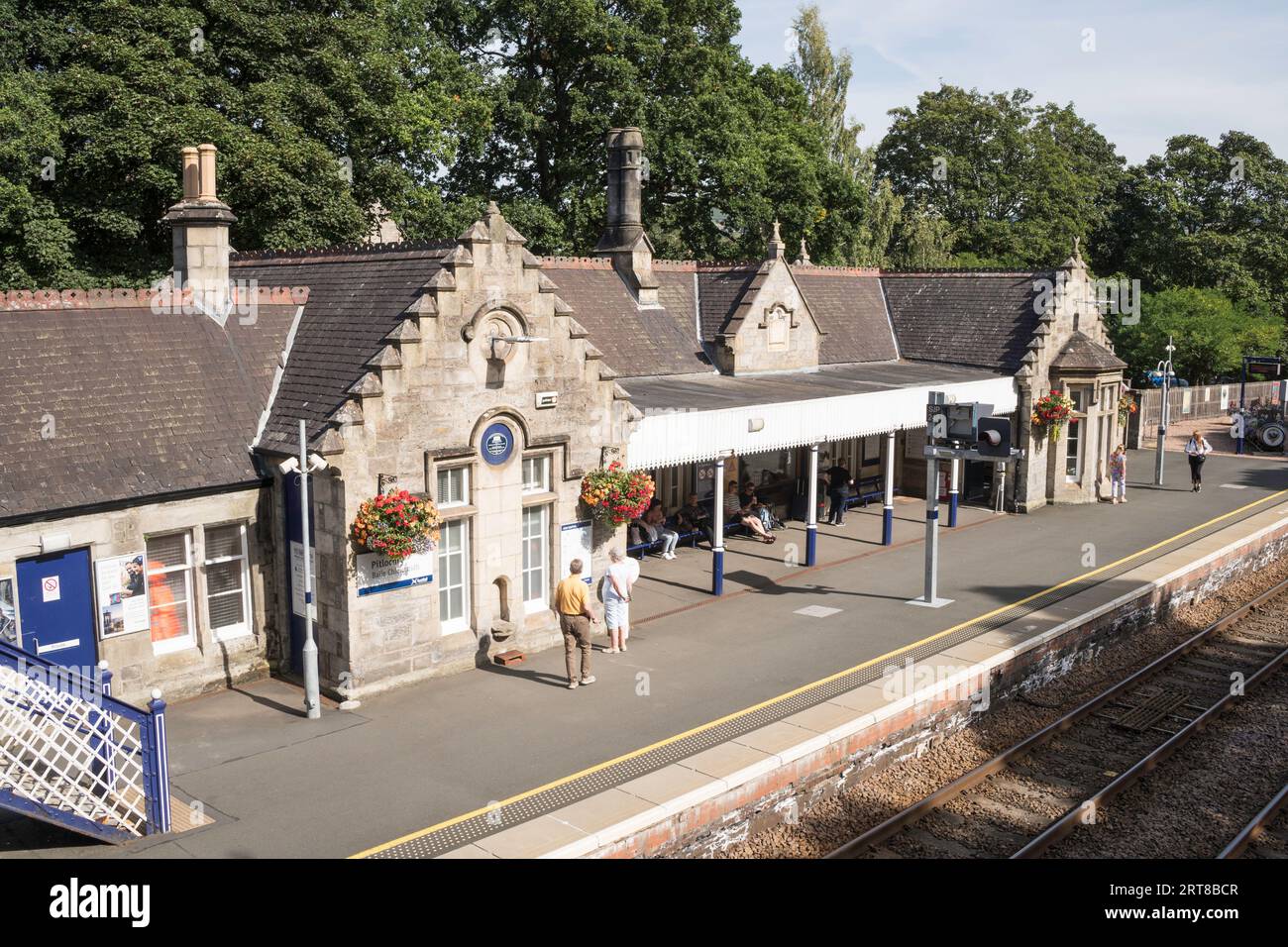 Passengers waiting at Pitlochry railway station, Scotland, UK Stock Photo