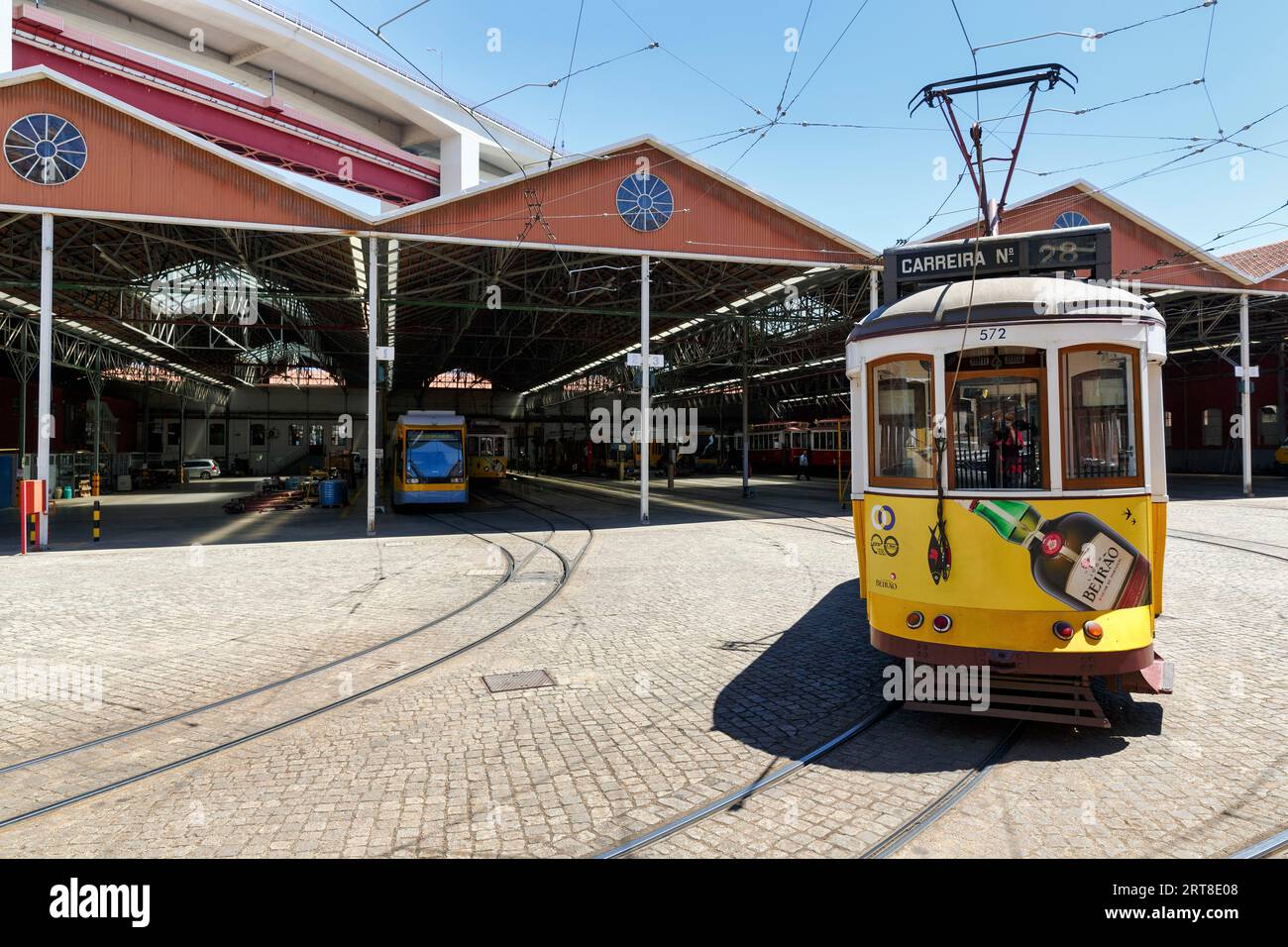 Historic yellow tram, Electrico, line 28 in front of tram depot and