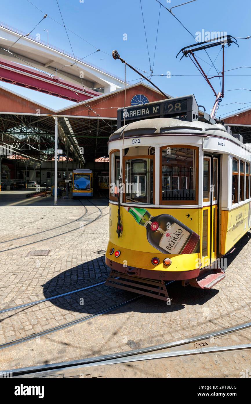 Historic yellow tram, Electrico, line 28 in front of tram depot and