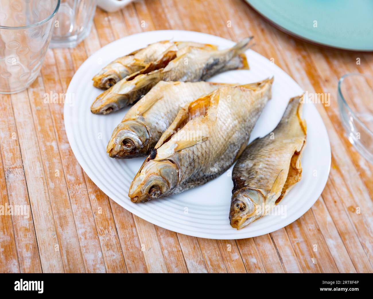 Dried roaches served on wooden table Stock Photo