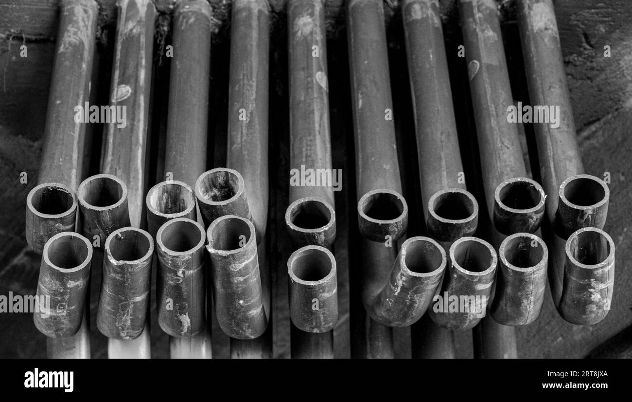 Pipes on the floor of an abandoned power plant. Stock Photo