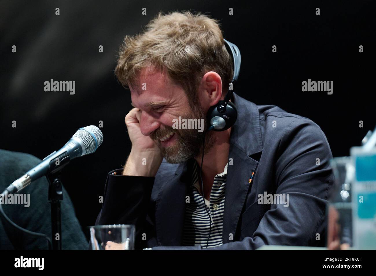 Berlin, Germany. 11th Sep, 2023. Paolo Giordano, Italian writer, sits on stage at the Haus der Berliner Festspiele and talks about his book 'Tasmania'. Giordano's first book, 'The Loneliness of Prime Numbers,' is one of Italy's most successful books. Credit: Annette Riedl/dpa/Alamy Live News Stock Photo