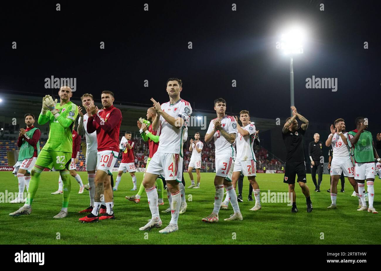 Wales players celebrate after the UEFA Euro 2024 Qualifying Group D match at the Skonto Stadium, Riga. Picture date: Monday September 11, 2023. Stock Photo
