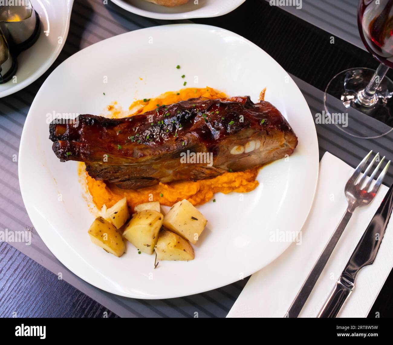 Pork ribs with BBQ sauce and sweet potato Stock Photo