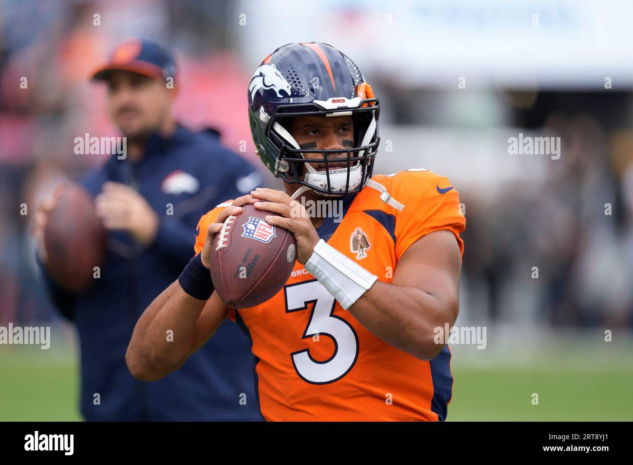 Denver Broncos quarterback Russell Wilson (3) warms up before the ...