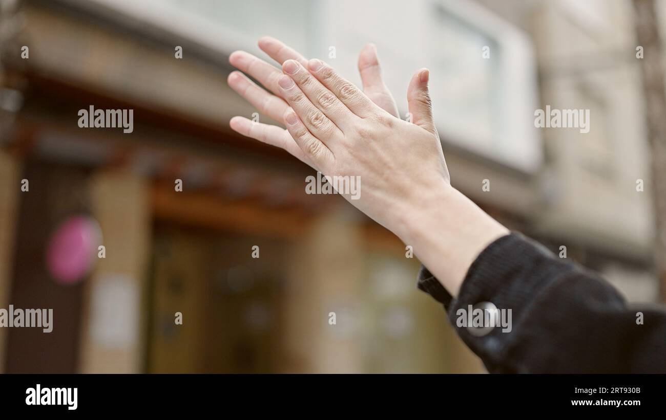 Hispanic woman clapping standing outdoor hi-res stock photography and ...