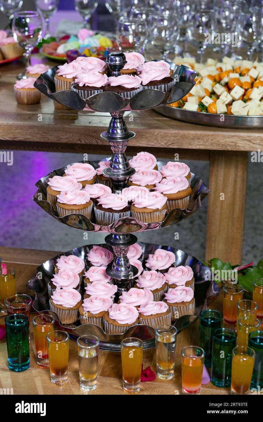 Social events; Individual Presentation Of Desserts For Guests At The Reception Stock Photo