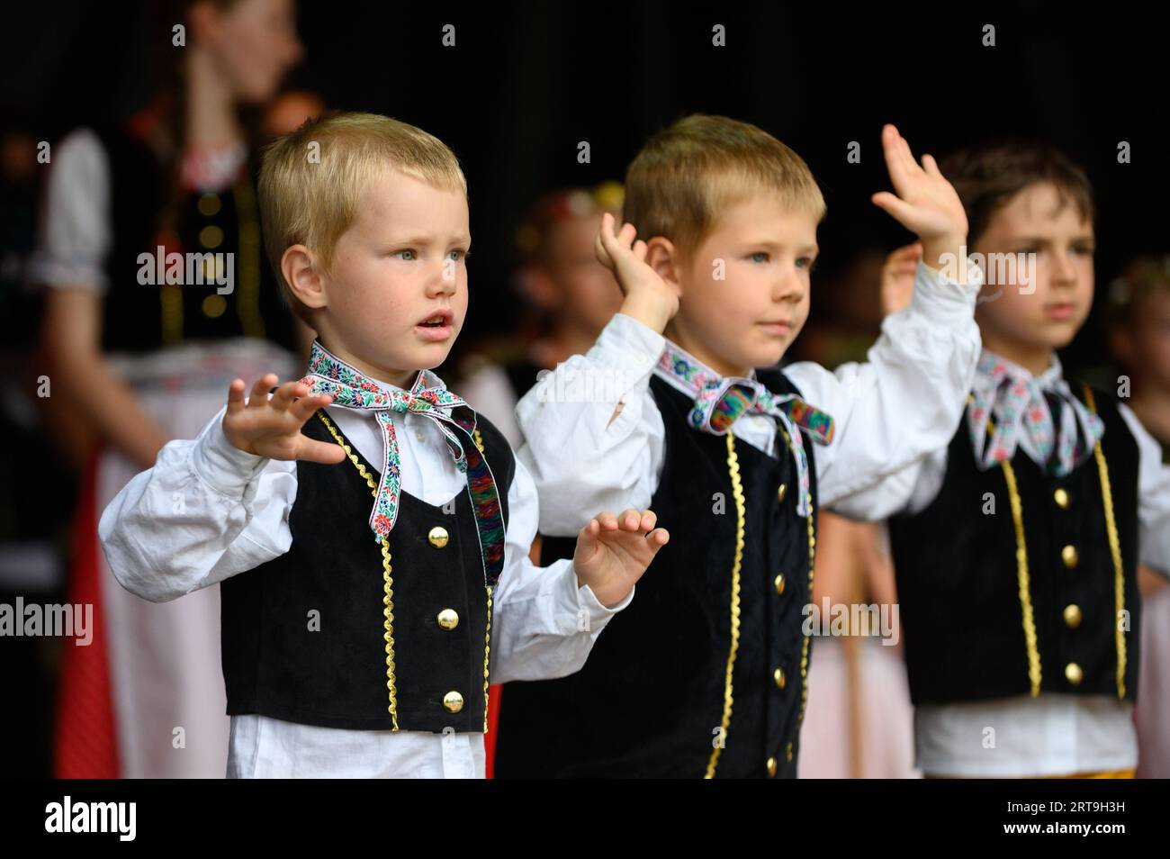 Czech and Slovak children performing traditional Czech and Slovak songs and dances at an event in Luxembourg. Stock Photo