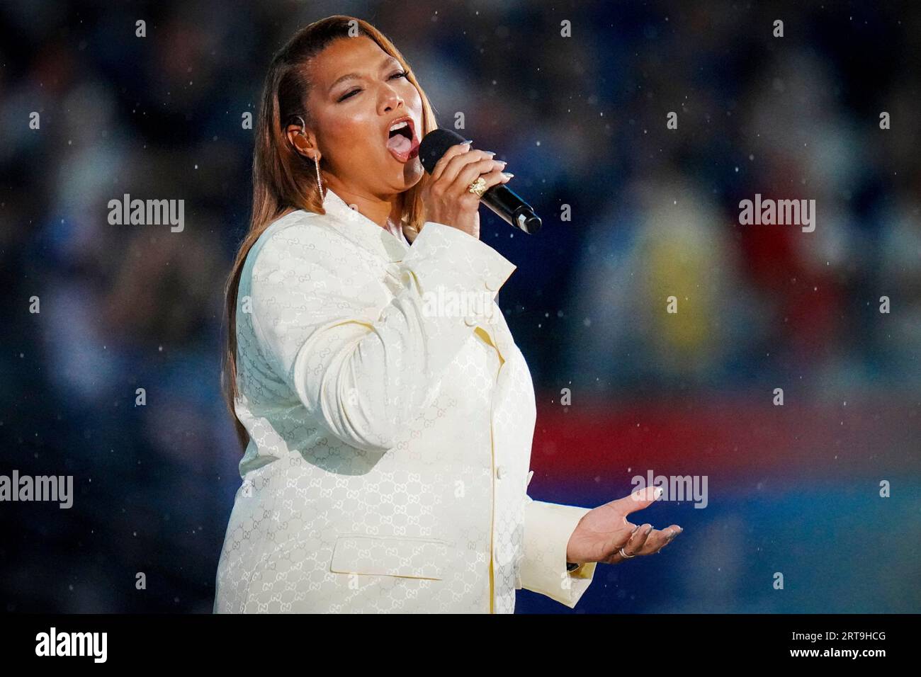 Female national anthem singer Stock Photo - Alamy