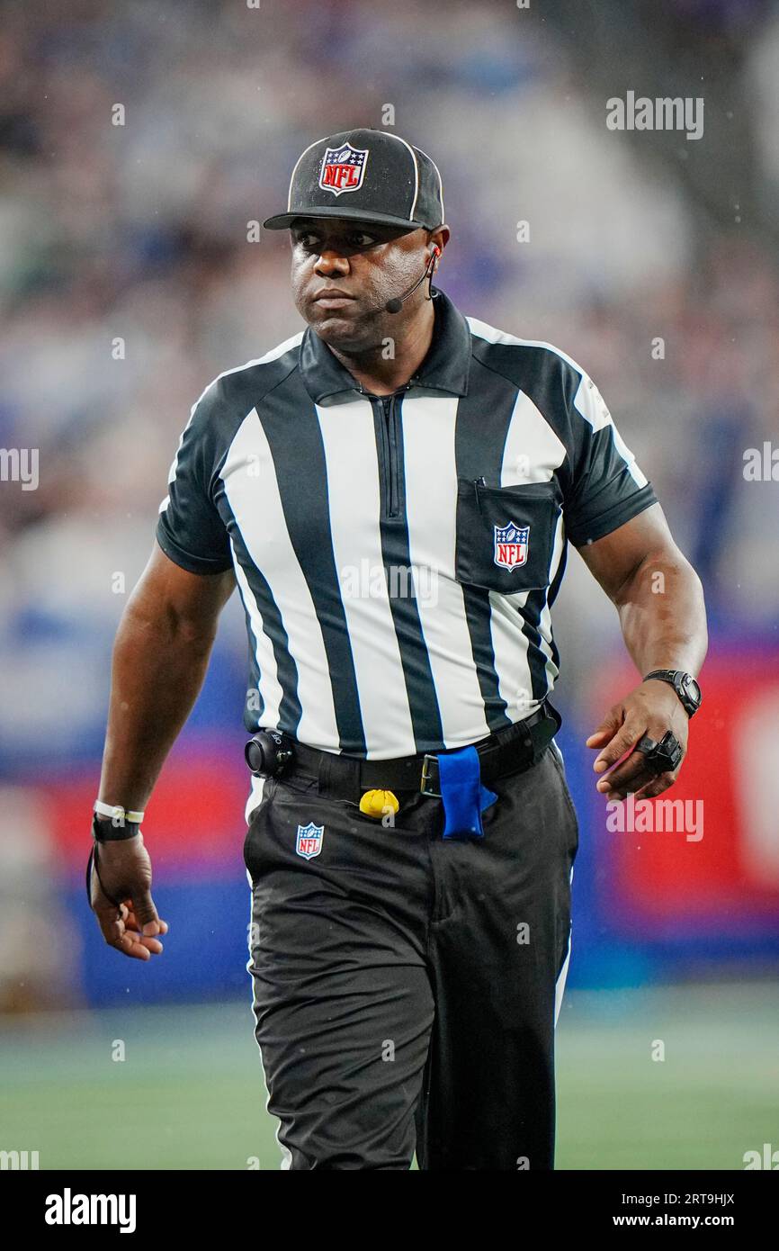 NFL line judge Tripp Sutter (37) walks the field during an NFL football  game between the Dallas Cowboys and New York Giants on Sunday, Sept. 10,  2023, in East Rutherford, N.J. (AP