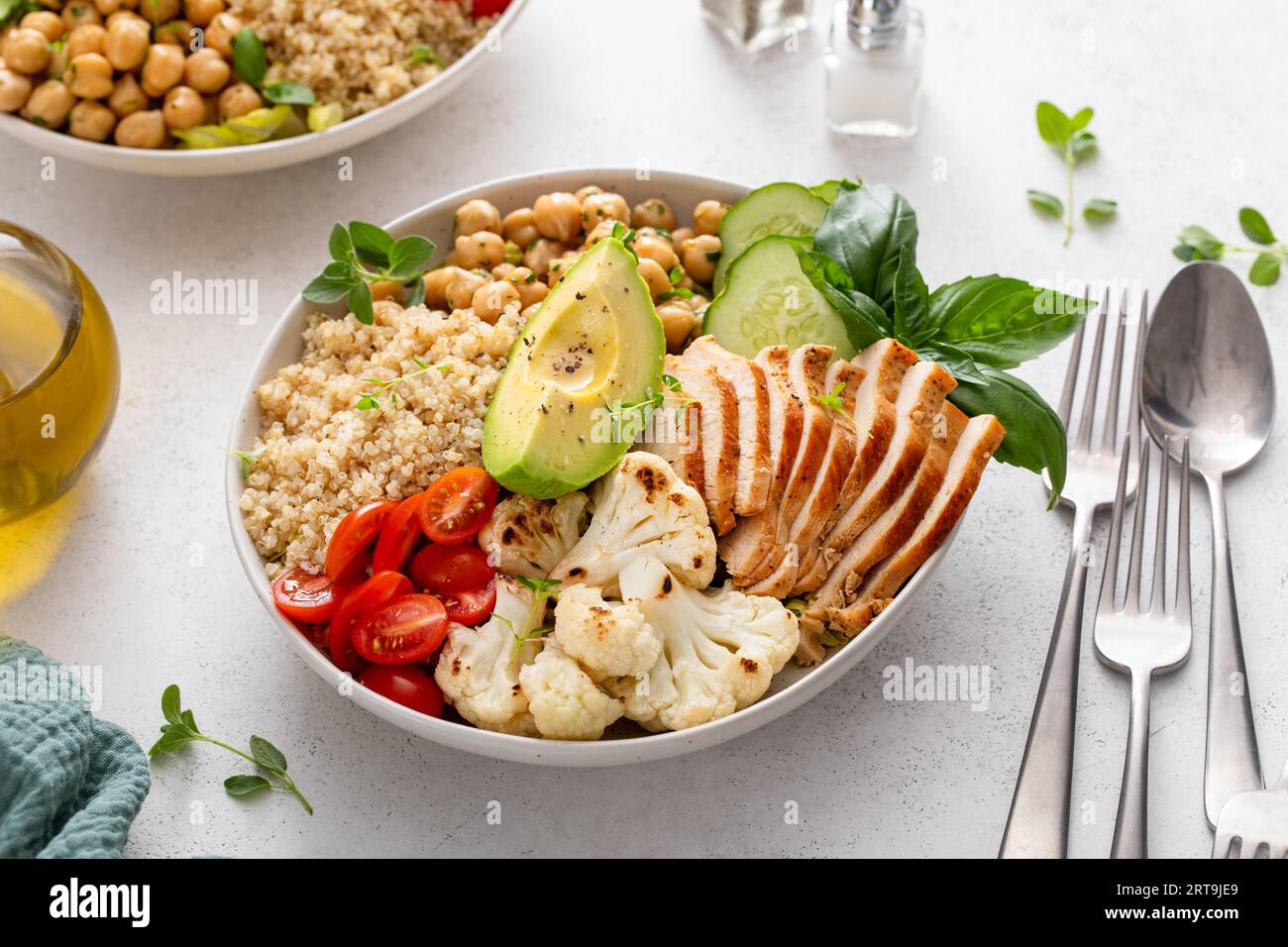 Healthy high protein lunch bowl with grilled chicken, roasted