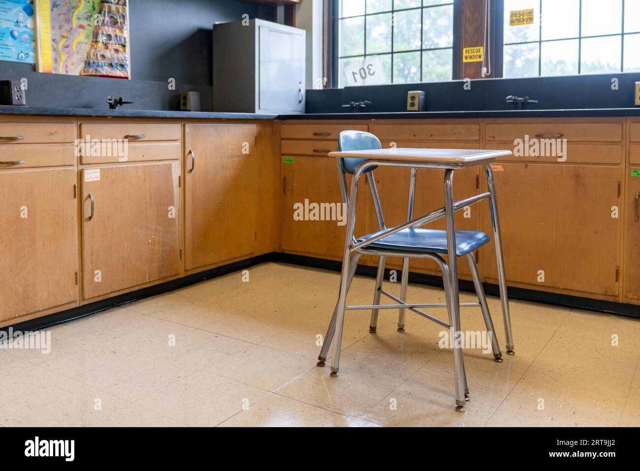 Example of an empty nondescript US High School Classroom with desks ...