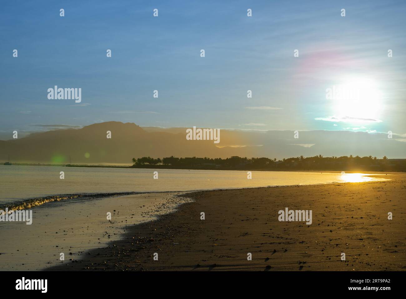 Sunrise over tropical beach at low tide, Denarau, Fiji Stock Photo - Alamy