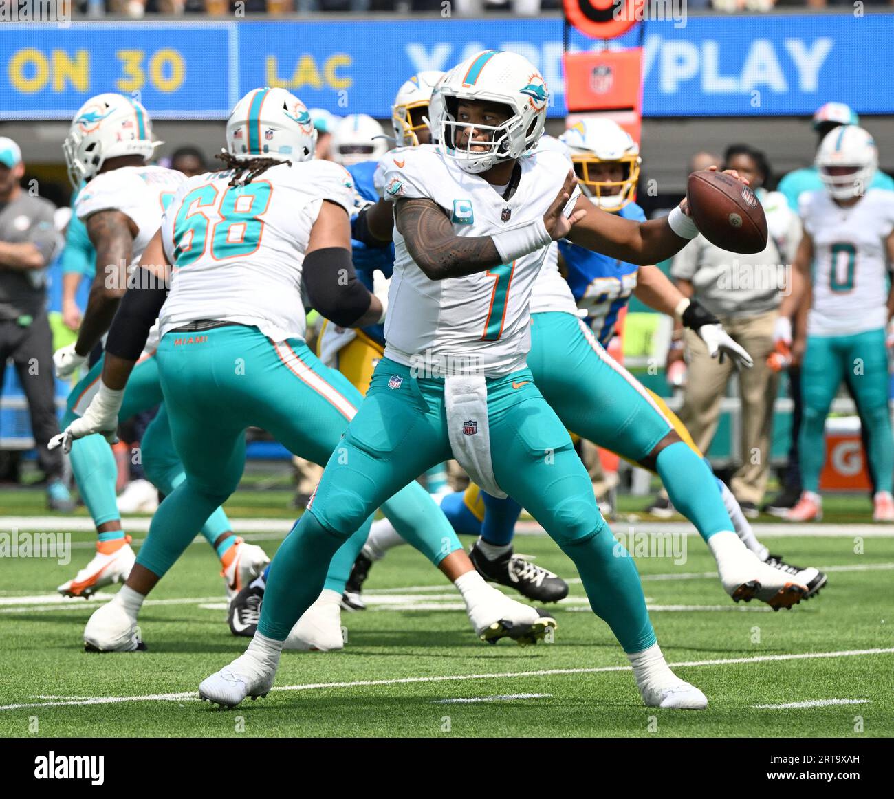 Inglewood, United States. 10th Sep, 2023. Dolphins Quarterback Tua  Tagovailoa passes the ball against the Chargers in first quarter action at  SoFi Stadium in Inglewood, California on Sunday, September 10, 2023. The