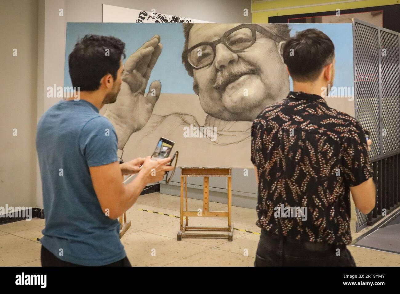 Madrid, Spain. 11th Sep, 2023. Two people look at a portrait of Salvador Allende at the entrance to the commemoration event for the 50th anniversary of the coup d'état in Chile. On the occasion of the 50th anniversary of the 1973 Chilean coup d'état by Augusto Pinochet against President Salvador Allende, an event is held at the headquarters of the Workers' Commissions (CCOO) in Madrid. Credit: SOPA Images Limited/Alamy Live News Stock Photo