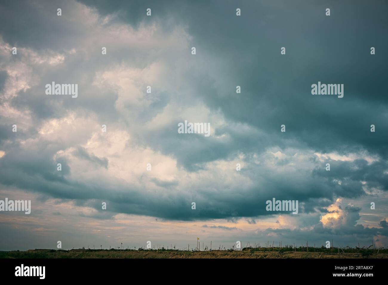 Dramatic rainy sky and dark clouds. Stock Photo