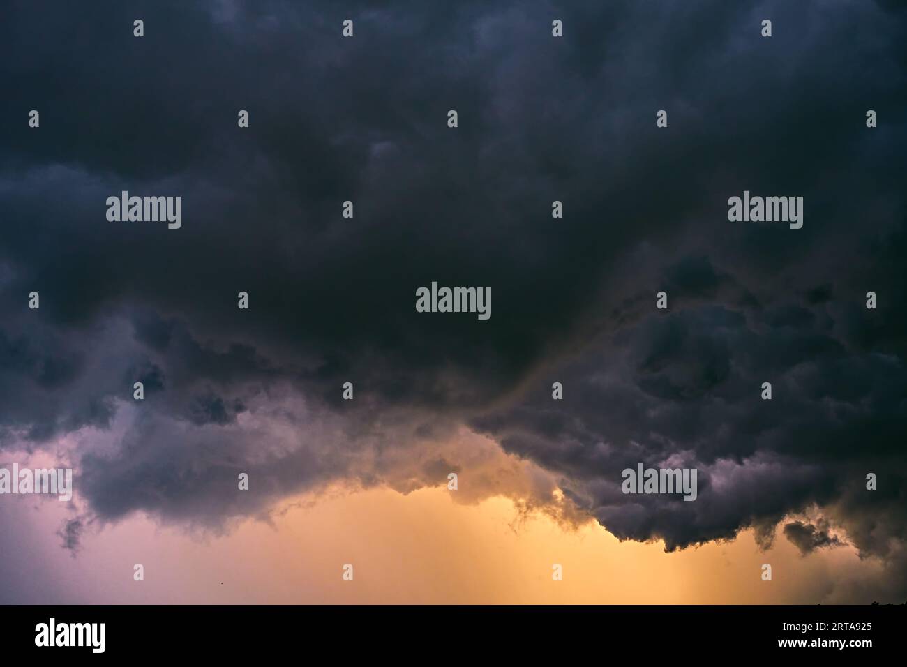 Dramatic rainy sky and dark clouds. Stock Photo