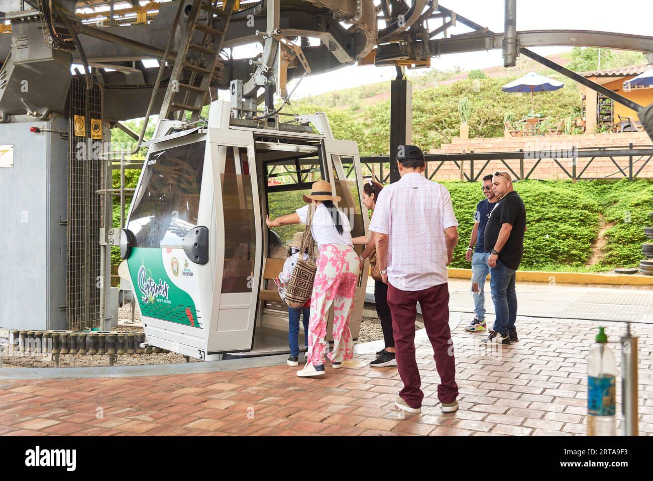 Aratoca, Santander, Colombia, Nov 23, 2022: People boarding a cable car ...