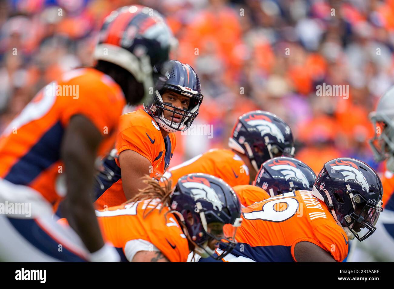 Denver Broncos quarterback Russell Wilson (3) lines up against the Las ...
