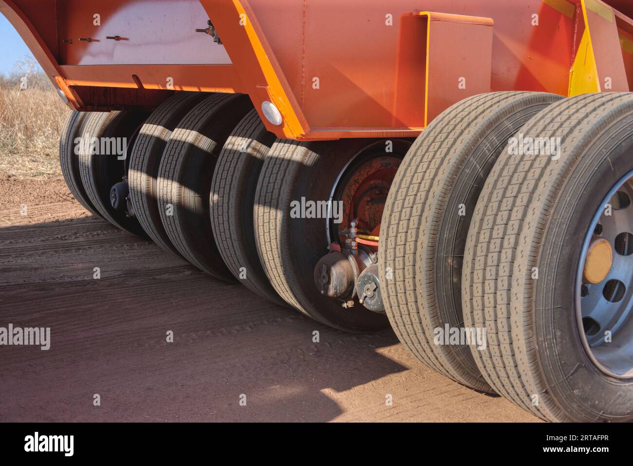 multi tire wheels on the axle of a heavy trailer what is hauling mining