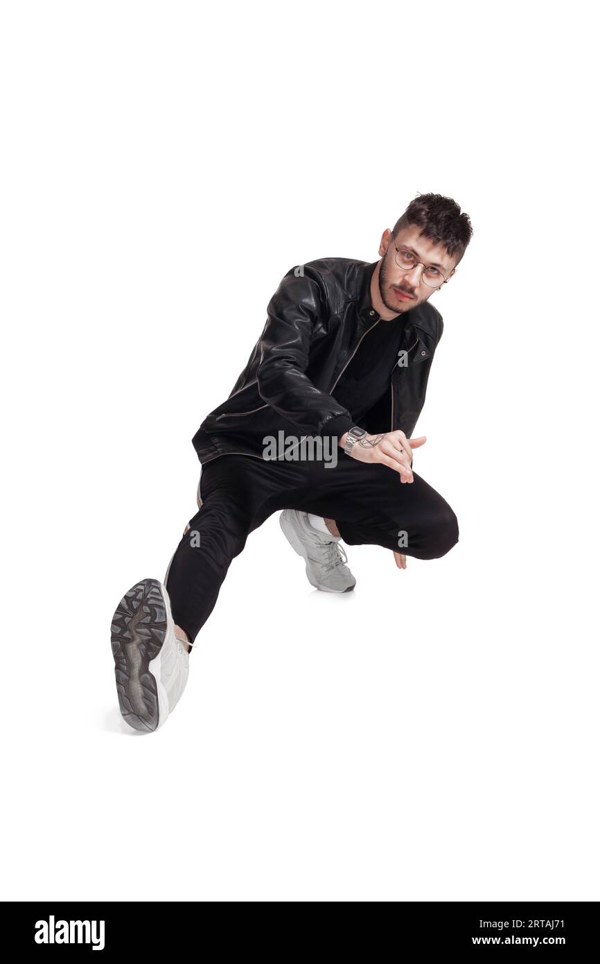 Full-length photo of a funny guy dancing in studio isolated on white ...