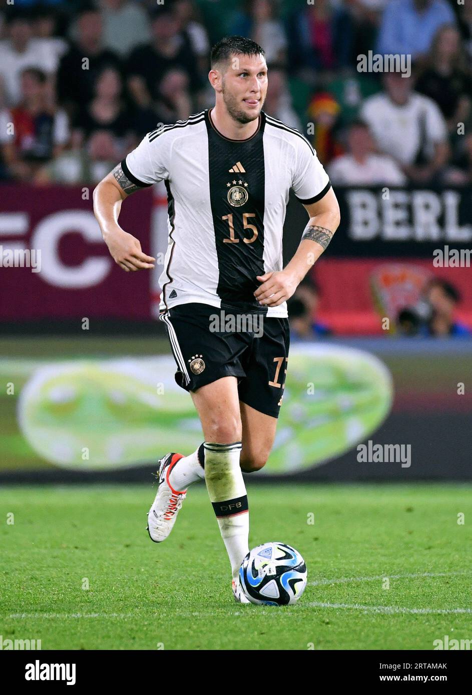 International football match at the Volkswagen Arena Wolfsburg: Germany - Japan 1:4; Niklas Suele (GER) Stock Photo
