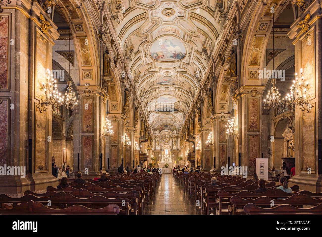 The ornate and brightly lit nave of the Catedral Metropolitana de Santiago de Chile, South America Stock Photo