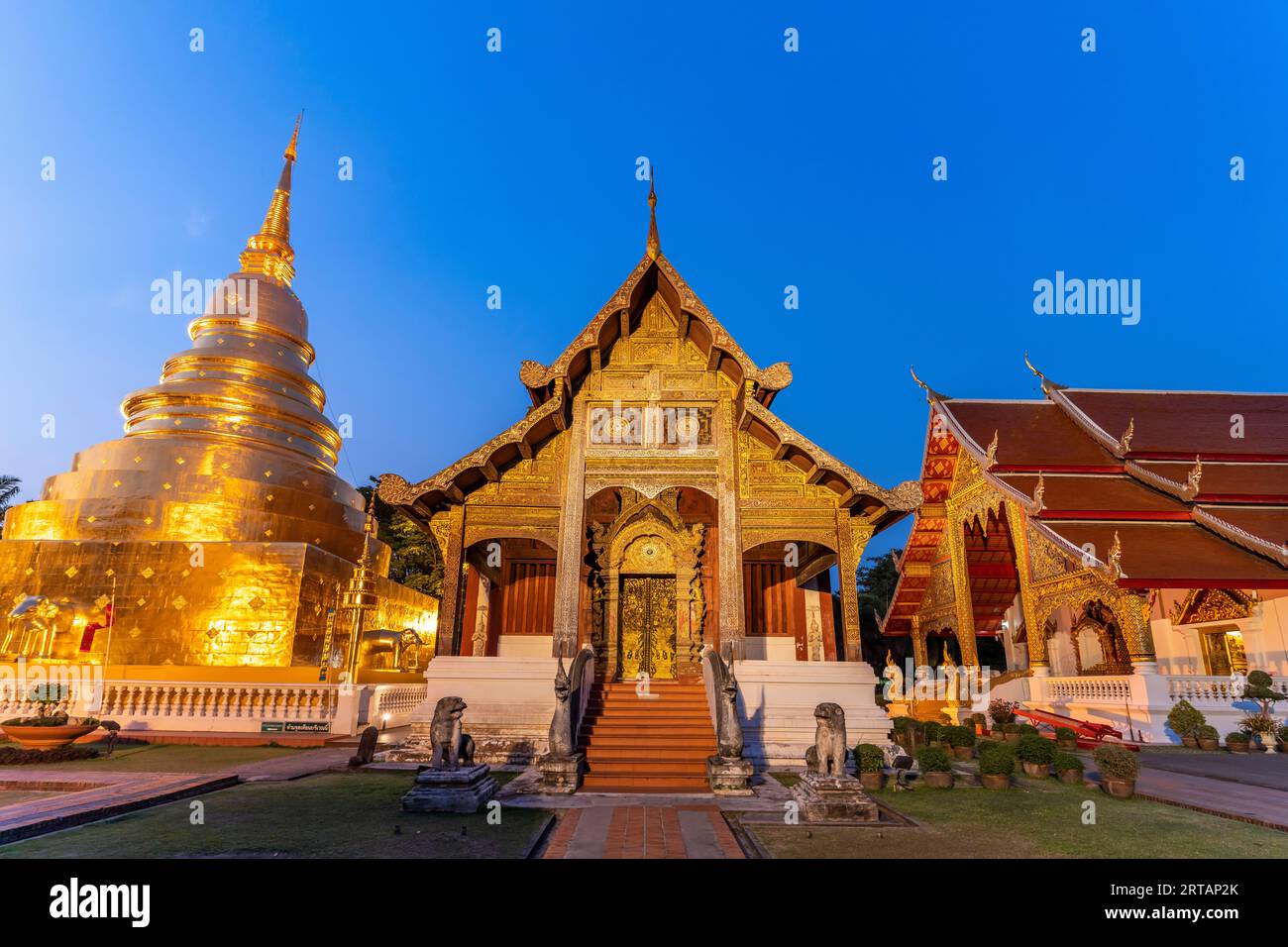 The Buddhist temple complex of Wat Phra Singh at dusk, Chiang Mai, Thailand, Asia Stock Photo