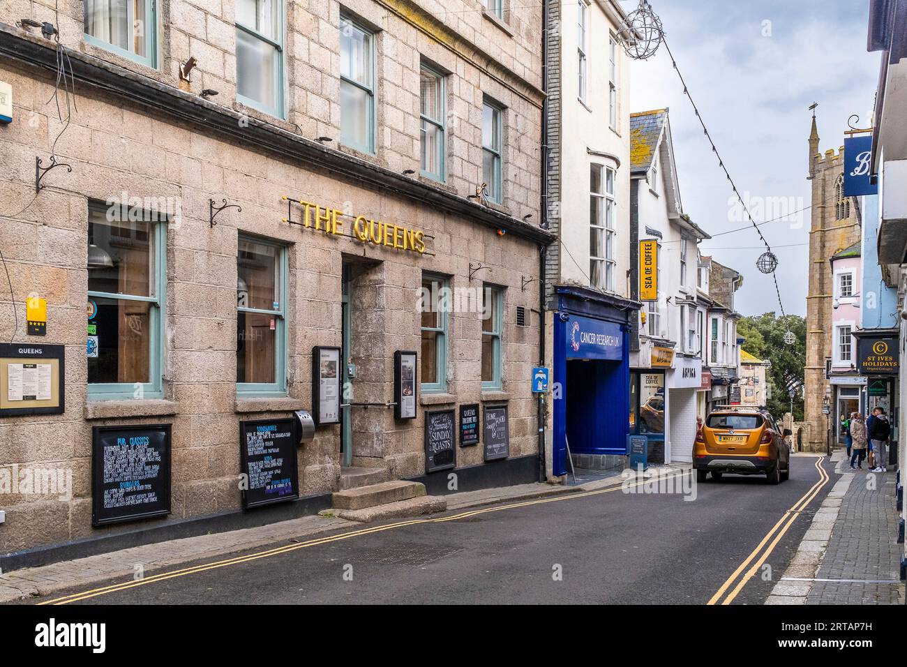 The exterior of The Queens hotel in St Andrews Street in the historic coastal town of St Ives in Cornwall in England in the UK. Stock Photo