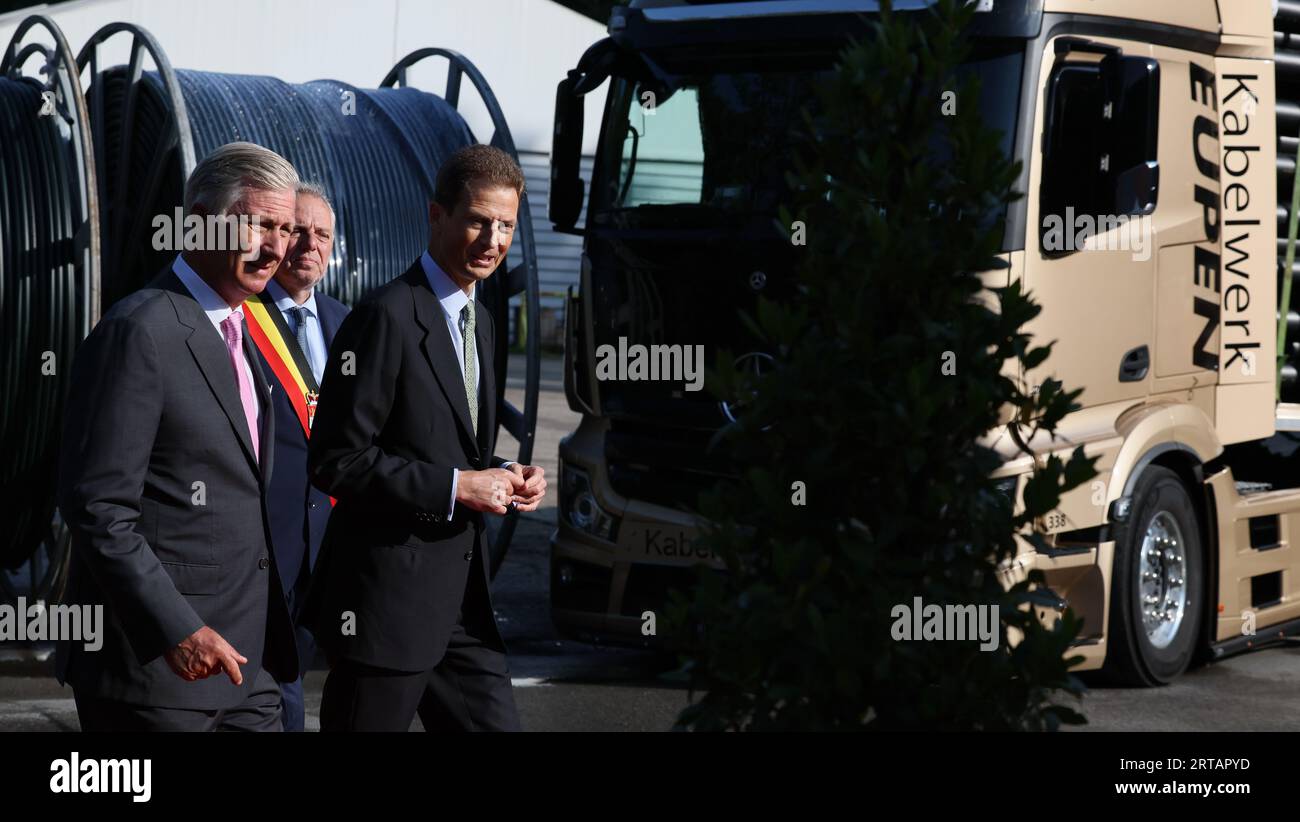 Eupen, Belgium. 12th Sep, 2023. King Philippe - Filip of Belgium (L) pictured during a visit to Kabelwerk Eupen AG, on the second day of the 19th informal summit of the heads of state of German-speaking countries, in Eupen, Tuesday 12 September 2023. BELGA PHOTO BENOIT DOPPAGNE Credit: Belga News Agency/Alamy Live News Stock Photo