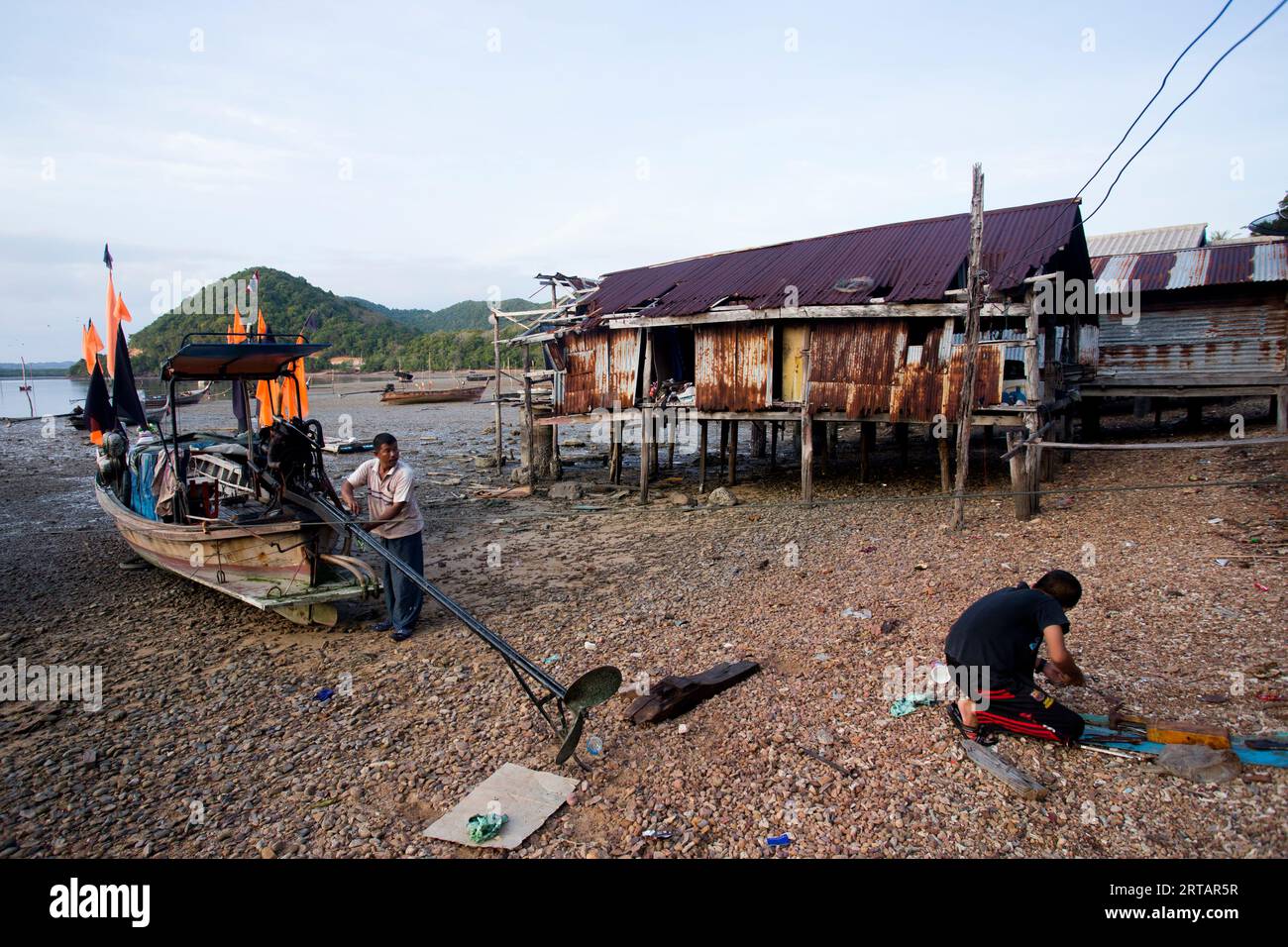 Koh Yao, Thailand; 1st January 2023: Fishermen fixing their long Tail boats in the fishing village of Koh Yao. Stock Photo